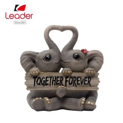 Estatuas decorativas de estatuilla de pareja de elefantes amorosos